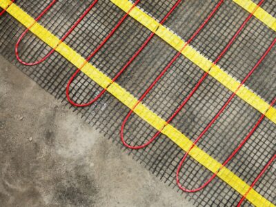 Installation of underfloor heating for thermal comfort using conduction radiation and convection.